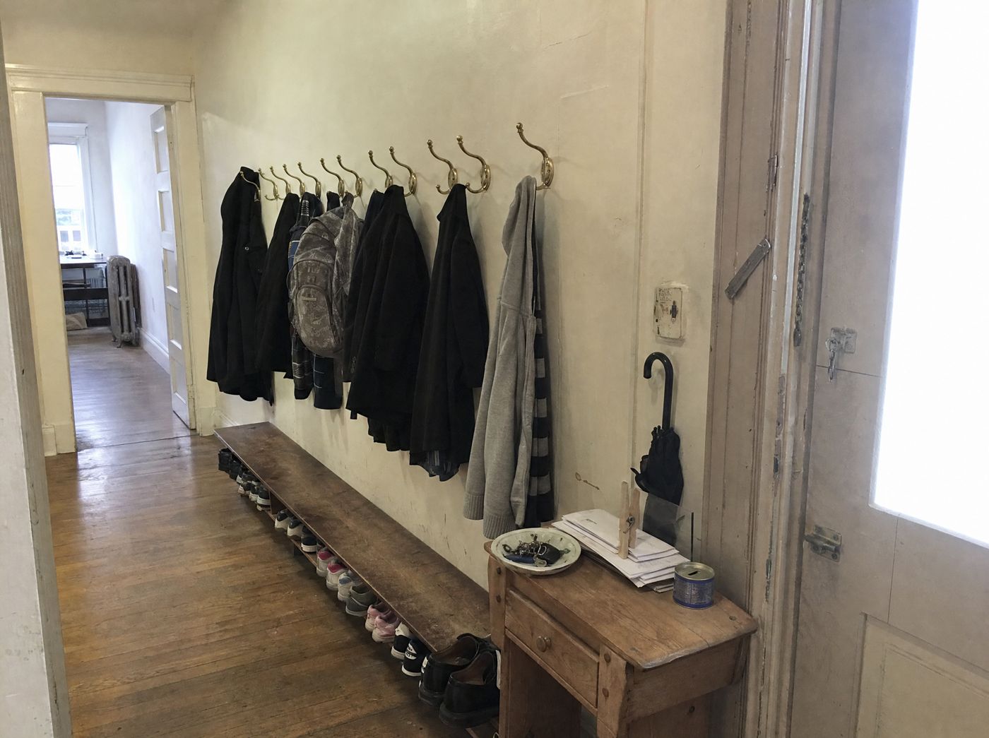 One hook per person by the door